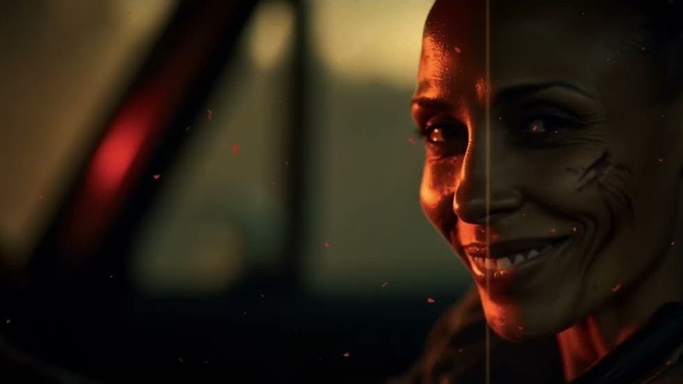 SCRAPHEART — film still: a character lit by red light inside a vehicle at dusk